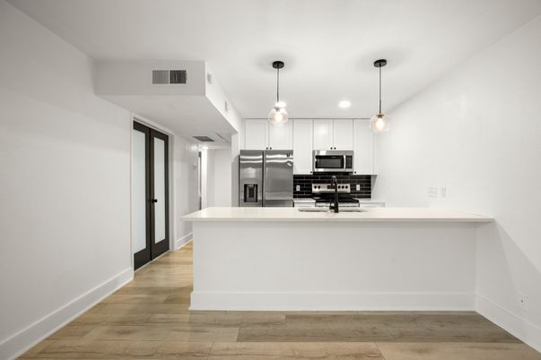 Interior, Kitchen, Pendant Lights, Recessed Lighting, Stainless Steel Appliances, Wood Texture Flooring