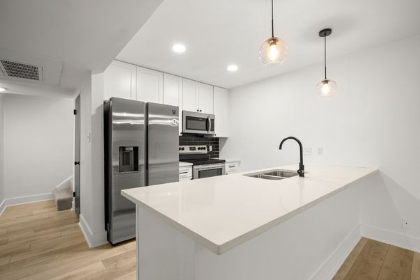Interior, Kitchen, Pendant Lights, Recessed Lighting, Stainless Steel Appliances, Wood Texture Flooring