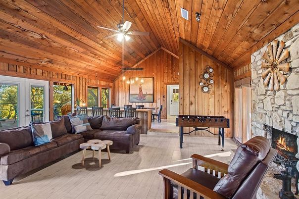 Dining room, Fireplace, Game Room, Interior, Living room, Pendant Lights, Stone Walls, Wooden Ceilings, Wood Texture Flooring, Wooden Walls