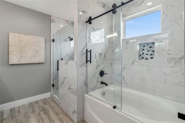Bathroom, Glass Shower, Interior, Marble Walls, Recessed Lighting, Wood Texture Flooring
