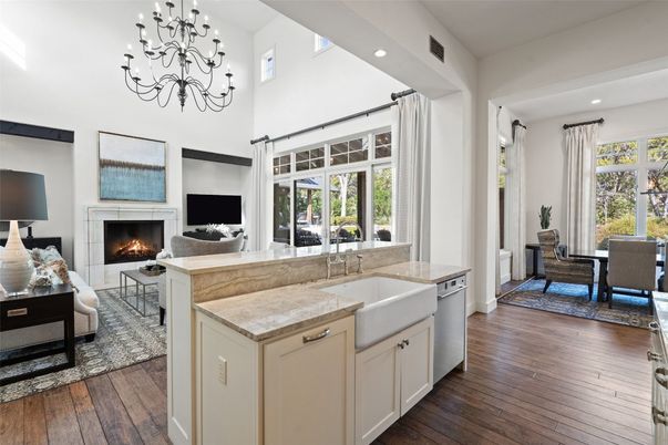 Chandelier, Dining room, Fireplace, Interior, Kitchen, Living room, Recessed Lighting, Wood Texture Flooring