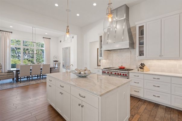 Dining room, Interior, Kitchen, Pendant Lights, Recessed Lighting, Stainless Steel Appliances, Wood Texture Flooring