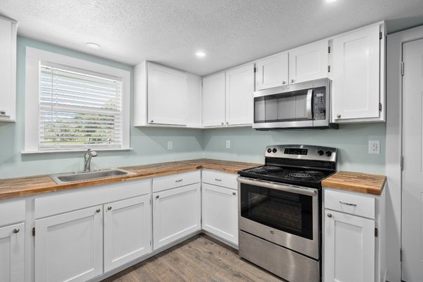 Interior, Kitchen, Recessed Lighting, Stainless Steel Appliances, Wood Texture Flooring