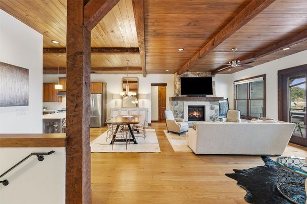 Dining room, Fireplace, Interior, Living room, Pendant Lights, Recessed Lighting, Wooden Beams, Wooden Ceilings, Wood Texture Flooring