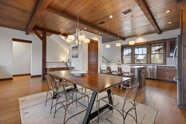 Dining room, Interior, Kitchen, Pendant Lights, Recessed Lighting, Stainless Steel Appliances, Wooden Beams, Wooden Ceilings, Wood Texture Flooring