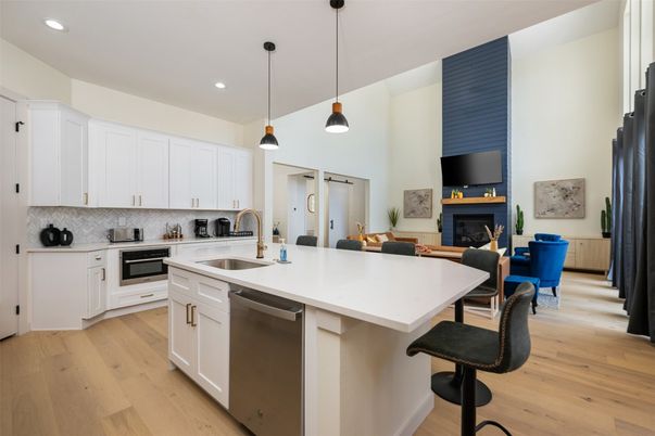 Fireplace, Interior, Kitchen, Pendant Lights, Recessed Lighting, Stainless Steel Appliances, Wood Texture Flooring