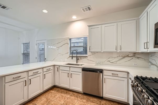 Interior, Kitchen, Marble Walls, Recessed Lighting, Stainless Steel Appliances