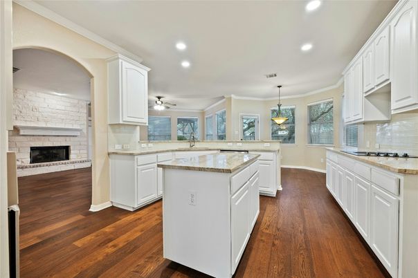 Fireplace, Interior, Kitchen, Pendant Lights, Recessed Lighting, Stone Walls, Wood Texture Flooring