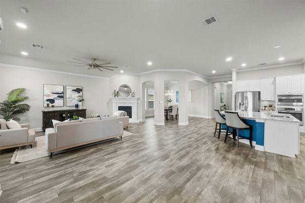 Dining room, Fireplace, Interior, Kitchen, Living room, Recessed Lighting, Stainless Steel Appliances, Wood Texture Flooring