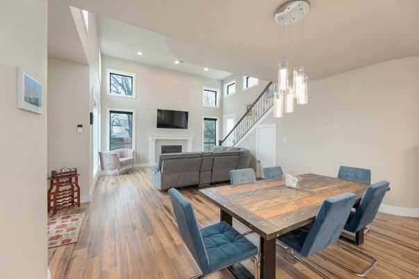Dining room, Fireplace, Interior, Living room, Pendant Lights, Recessed Lighting, Wood Texture Flooring