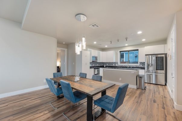 Dining room, Interior, Kitchen, Pendant Lights, Recessed Lighting, Stainless Steel Appliances, Wood Texture Flooring