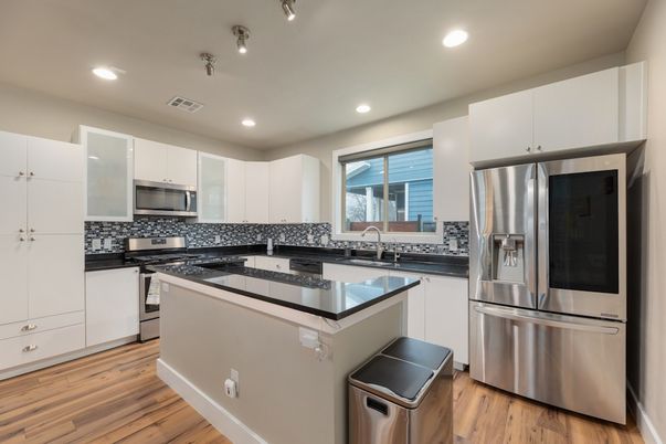 Interior, Kitchen, Recessed Lighting, Stainless Steel Appliances, Wood Texture Flooring