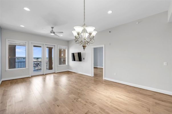 Chandelier, Empty room, Interior, Recessed Lighting, Water, Wood Texture Flooring