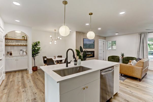 Dining room, Fireplace, Interior, Kitchen, Living room, Pendant Lights, Recessed Lighting, Stainless Steel Appliances, Wood Texture Flooring