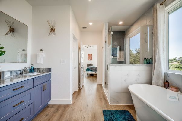 Bathroom, Dual Sink Vanities, Free Standing Baths, Interior, Recessed Lighting, Wood Texture Flooring