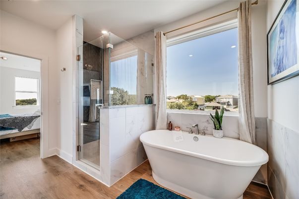 Bathroom, Free Standing Baths, Glass Shower, Interior, Recessed Lighting, Wood Texture Flooring