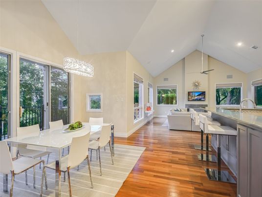 Dining room, Fireplace, Interior, Living room, Pendant Lights, Recessed Lighting, Wood Texture Flooring