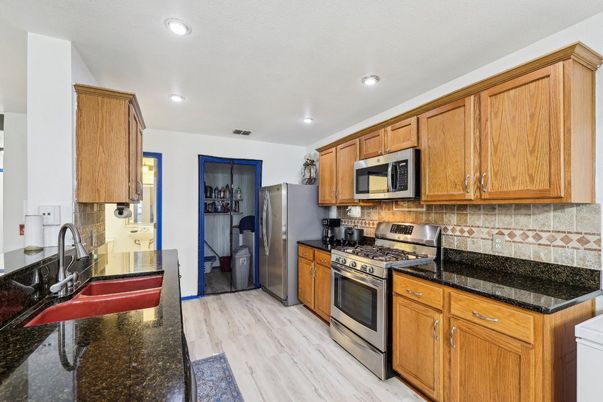 Interior, Kitchen, Recessed Lighting, Stainless Steel Appliances, Wood Texture Flooring