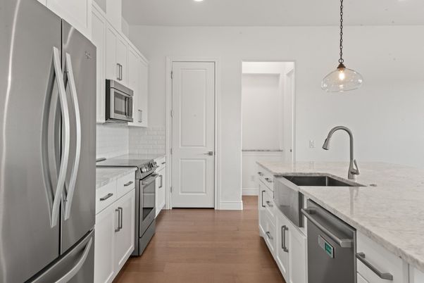 Interior, Kitchen, Pendant Lights, Recessed Lighting, Stainless Steel Appliances, Wood Texture Flooring