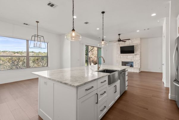 Fireplace, Interior, Kitchen, Pendant Lights, Recessed Lighting, Stone Walls, Wood Texture Flooring