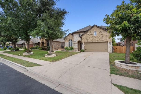Attached, Backyard, Exterior, Facade, Brick Facade, Brick Traditional