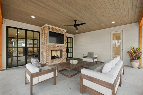 Exterior, Fireplace, Living room, Recessed Lighting, Stone Walls