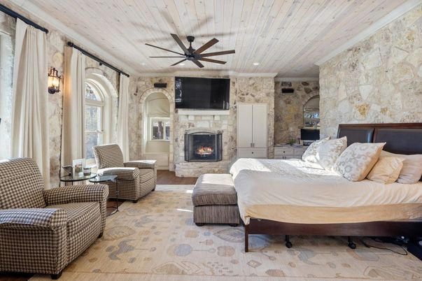 Bedroom, Fireplace, Interior, Recessed Lighting, Stone Walls, Wooden Ceilings