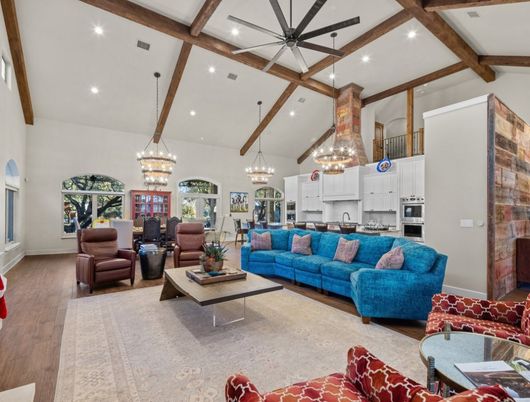 Chandelier, Dining room, Interior, Kitchen, Living room, Pendant Lights, Recessed Lighting, Stainless Steel Appliances, Wooden Beams, Wood Texture Flooring