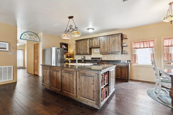 Chandelier, Interior, Kitchen, Pendant Lights, Stainless Steel Appliances, Wood Texture Flooring