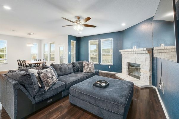 Dining room, Fireplace, Interior, Living room, Pendant Lights, Recessed Lighting, Wood Texture Flooring