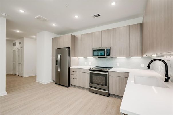 Interior, Kitchen, Recessed Lighting, Stainless Steel Appliances, Wood Texture Flooring