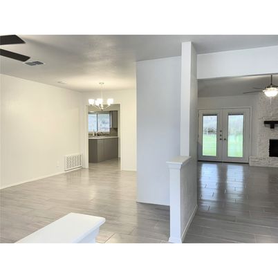 Chandelier, Empty room, Fireplace, Interior, Wood Texture Flooring