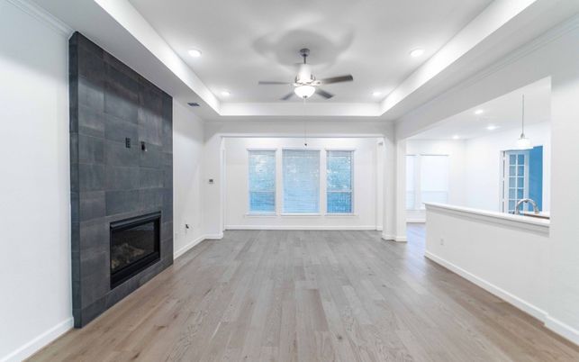 Empty room, Fireplace, Interior, Pendant Lights, Recessed Lighting, Wood Texture Flooring