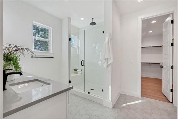 Bathroom, Glass Shower, Interior, Recessed Lighting, Walk-in Closets, Wood Texture Flooring