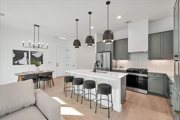 Dining room, Interior, Kitchen, Pendant Lights, Recessed Lighting, Stainless Steel Appliances, Wood Texture Flooring