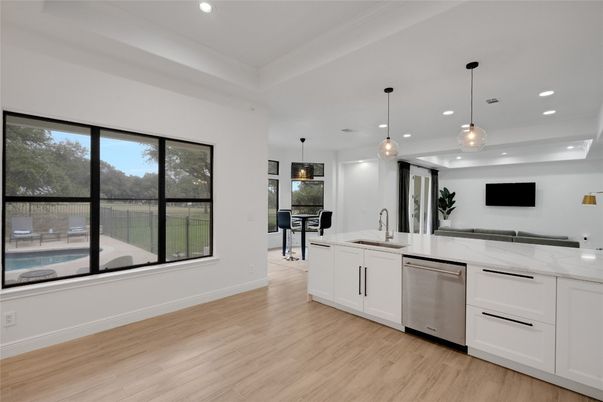 Interior, Kitchen, Pendant Lights, Recessed Lighting, Stainless Steel Appliances, Wood Texture Flooring