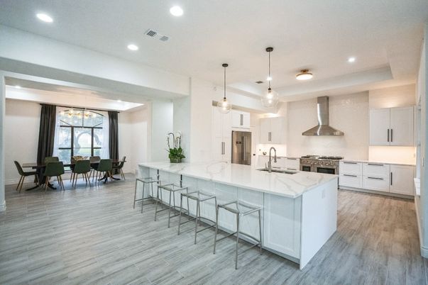 Dining room, Interior, Kitchen, Pendant Lights, Recessed Lighting, Stainless Steel Appliances, Wood Texture Flooring