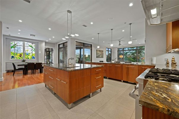 Dining room, Interior, Kitchen, Pendant Lights, Recessed Lighting, Stainless Steel Appliances, Wood Texture Flooring
