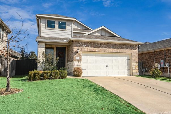 Attached, Exterior, Facade, Brick Facade, American Craftsman