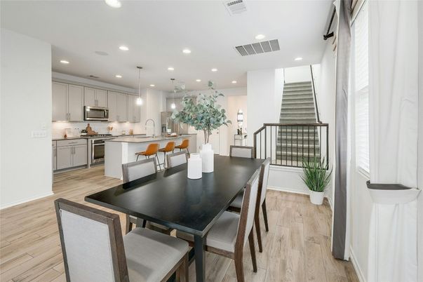 Dining room, Interior, Kitchen, Pendant Lights, Recessed Lighting, Stainless Steel Appliances, Wood Texture Flooring