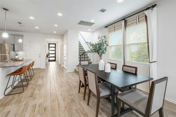 Dining room, Interior, Kitchen, Pendant Lights, Recessed Lighting, Stainless Steel Appliances, Wood Texture Flooring