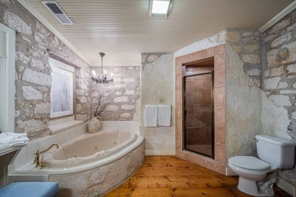 Bathroom, Chandelier, Glass Shower, Interior, Pendant Lights, Stone Walls, Wood Texture Flooring