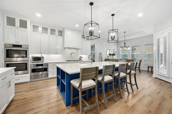 Dining room, Interior, Kitchen, Pendant Lights, Recessed Lighting, Stainless Steel Appliances, Wood Texture Flooring