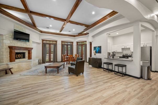 Fireplace, Interior, Kitchen, Living room, Recessed Lighting, Stainless Steel Appliances, Stone Walls, Wooden Beams, Wood Texture Flooring