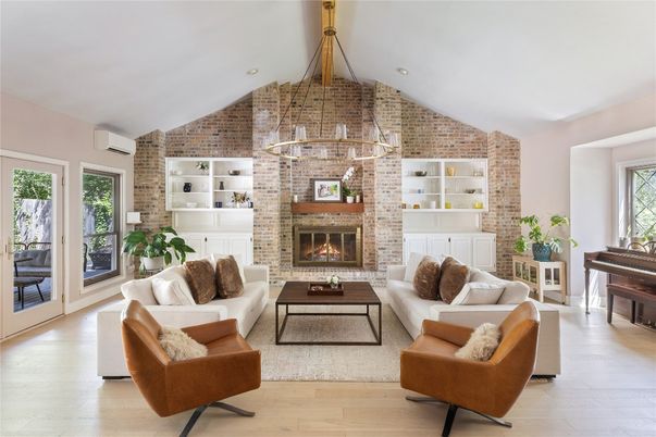 Fireplace, Interior, Living room, Piano, Recessed Lighting, Stone Walls, Wood Texture Flooring