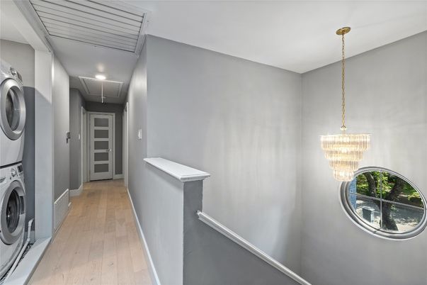 Chandelier, Interior, Utility Closets, Washer, Wood Texture Flooring