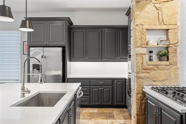 Interior, Kitchen, Pendant Lights, Stainless Steel Appliances, Stone Walls
