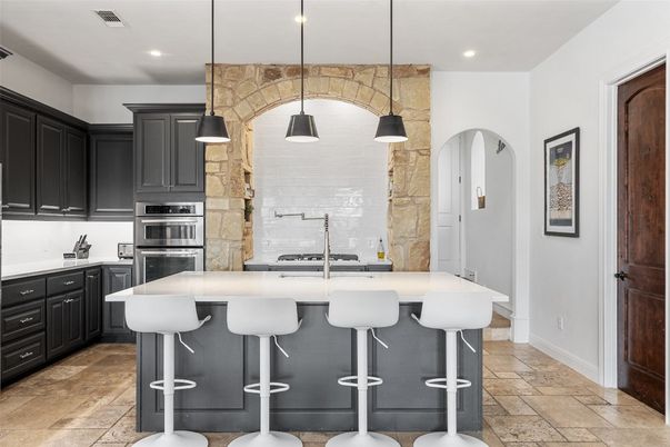 Interior, Kitchen, Pendant Lights, Recessed Lighting, Stainless Steel Appliances, Stone Walls
