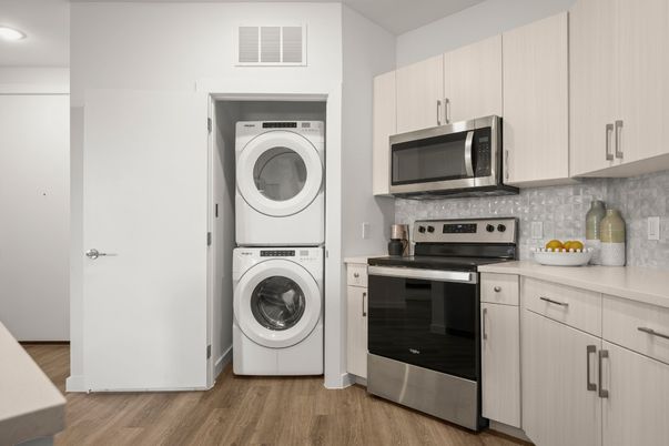 Interior, Kitchen, Recessed Lighting, Stainless Steel Appliances, Utility Closets, Washer, Wood Texture Flooring