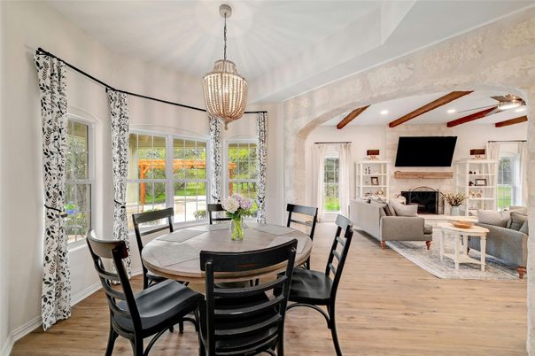 Dining room, Fireplace, Interior, Living room, Pendant Lights, Recessed Lighting, Wooden Beams, Wood Texture Flooring